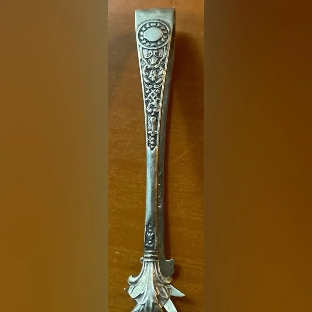 JMC&S antique silver